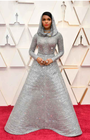 Janelle monáe stuns in the red carpet of 92nd annual academy awards in silver hooded gown. (getty images)