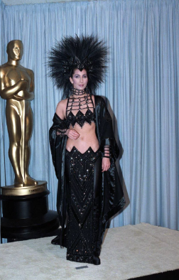 Cher looked like a gothic queen in an all black shimmer ensemble(getty images )