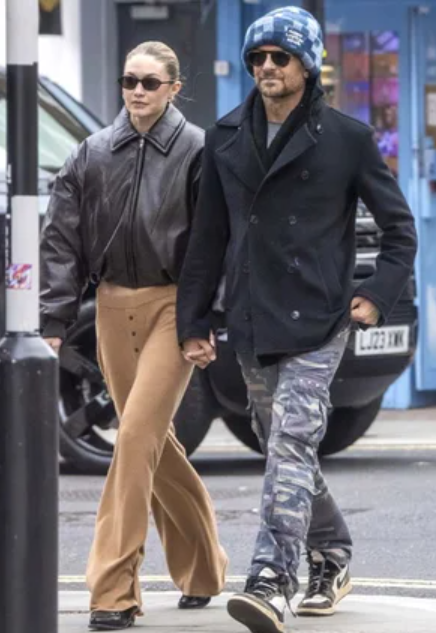 Bradley cooper and gigi hadid hold hands during london outing